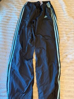 adidas Black wind pants with Light Blue Side Stripes